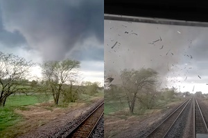 竜巻vs電車。逃げようが無い状況で竜巻が迫ってくる恐怖映像。